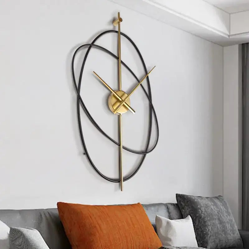 Wandklok Modern Minimalistisch met Gouden Wijzers en Ovale Metalen Ringen