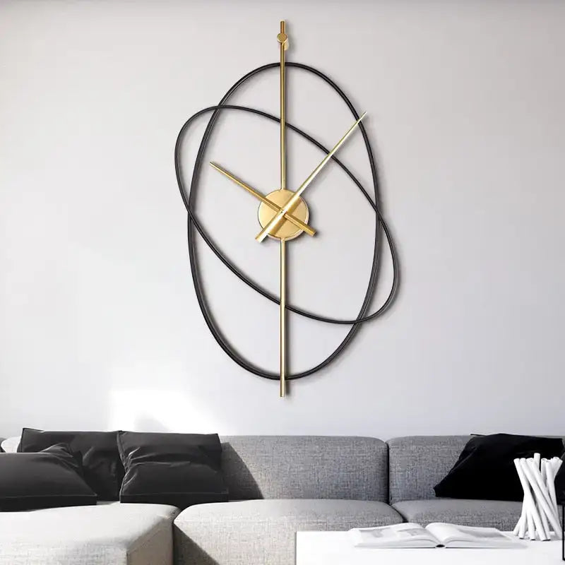 Wandklok Modern Minimalistisch met Gouden Wijzers en Ovale Metalen Ringen