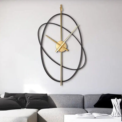 Wandklok Modern Minimalistisch met Gouden Wijzers en Ovale Metalen Ringen