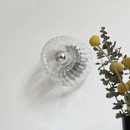 Wandlamp Art Deco met Gedraaid Glazen Bol en Zonnestraal Lichteffect