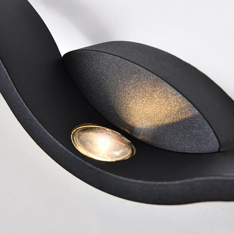 Wandlamp Modern LED met Golvend Design en Sfeervolle Lichtprojectie